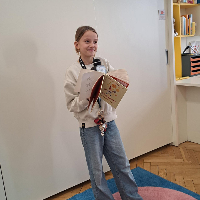 Branje poezije v šolski knjižnici 